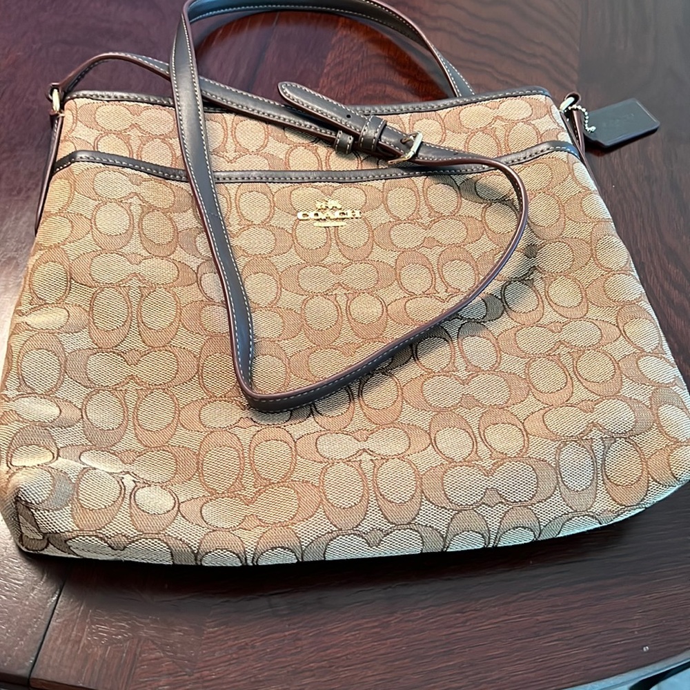 Coach’s cross body. Never used.